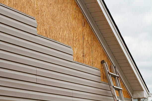 Professional Siding Replacement technician working in Pineville, PA